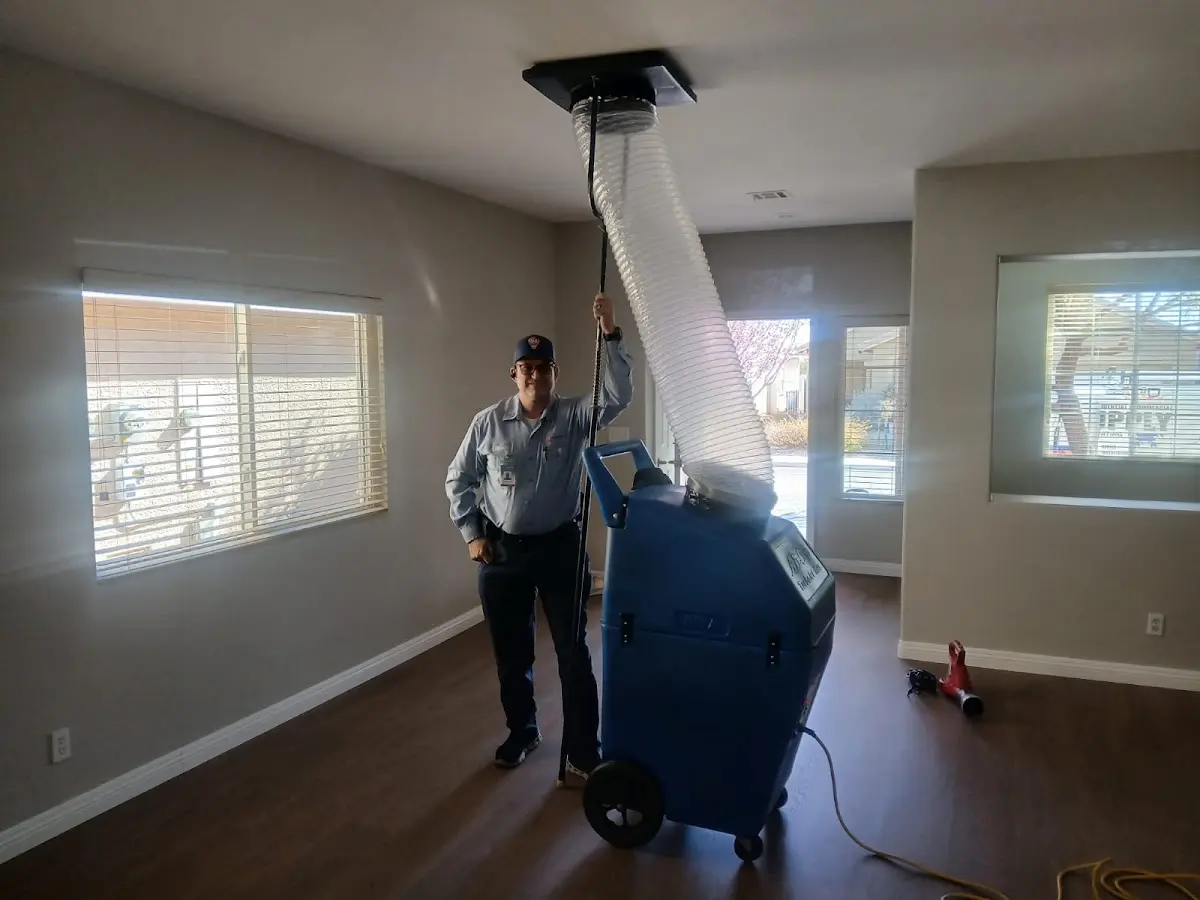 Professional Dryer Vent Cleaning work inside a Heath home